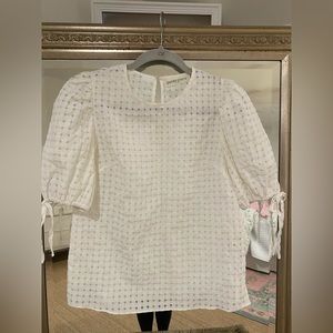 white pants store top